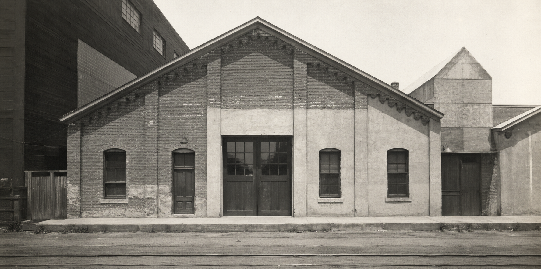 The original 1886 warehouse facade on Wazee Street, photographed in black and white